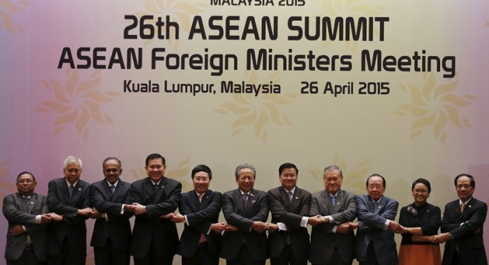 asean_leaders_pose_for_a_photo_at_the_foreign_ministers_meeting_for_the_26th_asean_summit_in_kuala_lumpur_ZZSK