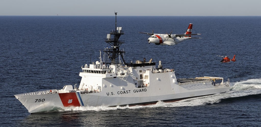 The U. S. Coast Guard's first national security cutter took to the sea operating in concert with the service's new maritime patrol aircraft, the Ocean Sentry HC-144, and a newly re-engined HC-65 helicopter Monday, Feb. 11, 2008. The flagship in the Coast Guard's first new class of large cutters in 25 years, Bertholf is the Coast Guard's largest ever patrol cutter. The launch in Pascagoula, Miss., began four days of builder trials that will test the cutter's systems and performance in advance of the Coast Guard formally accepting it later this spring, and commissioning the cutter for service this summer. Bertholf will be homeported in Alameda, Calif. U.S. Coast Guard photo by PAC Tom Sperduto