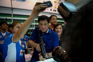 Duterte holding firearms