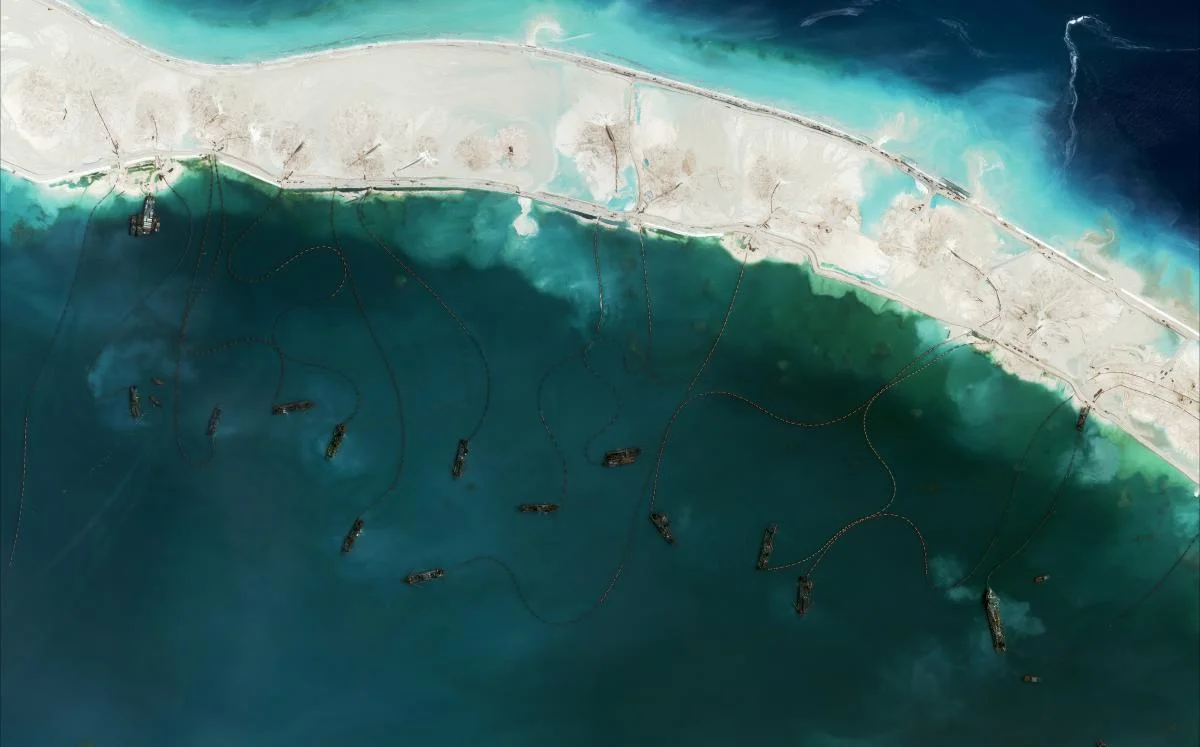 Mischief Reef falls within the exclusive economic zone of the Philippines, lying 129 nautical miles from Palawan. Image source: AMTI