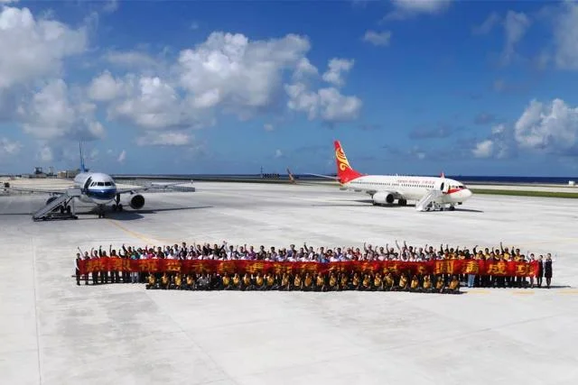 China Southern Airlines plane lands at the airfield on Fiery Cross Reef (Kagitingan Reef in the Philippines) in the South China Sea on Wednesday, Jan. 6, 2016. Xinhua/Cha Chunming