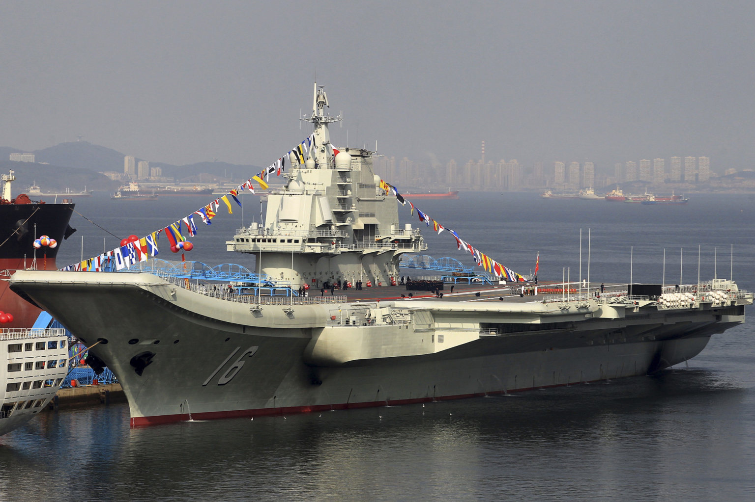 Liaoning aircraft carrier inducted in Dalian in September 2012, Source: Wikipedia